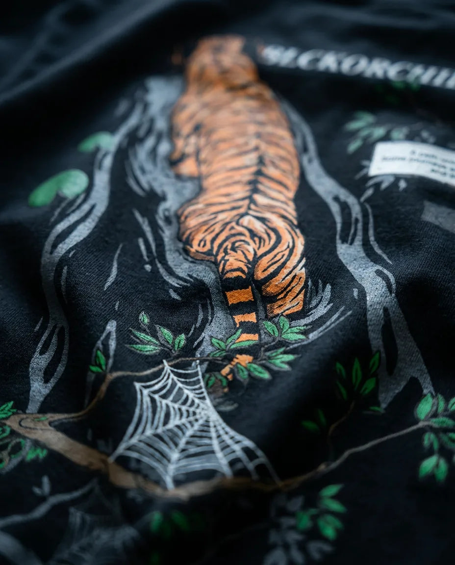 Close-up of the Tiger River Tee artwork detail