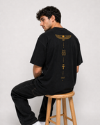Color: Black | View: Back seated | Symbol Tee