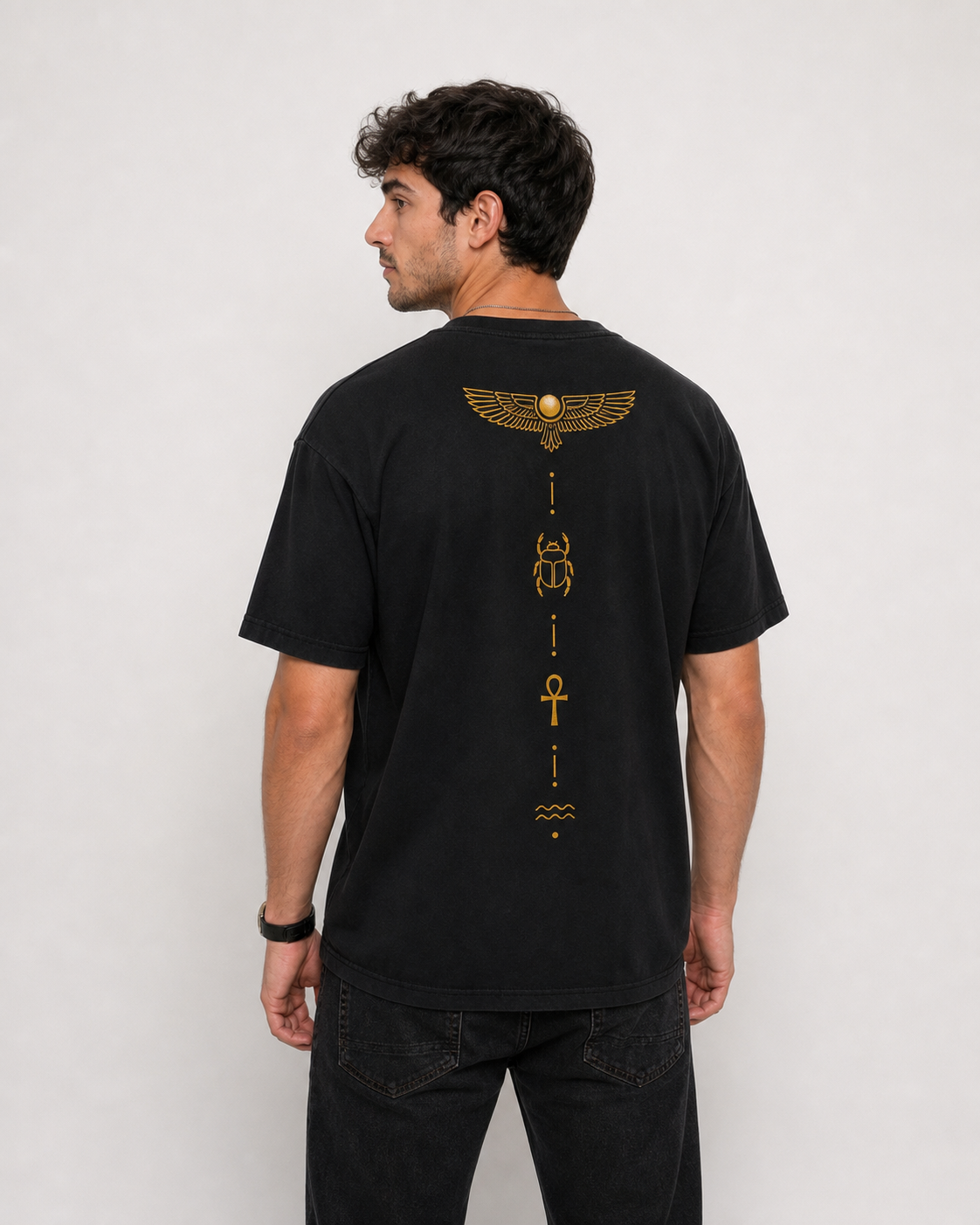 Color: Black | View: Back three-quarter | Symbol Tee